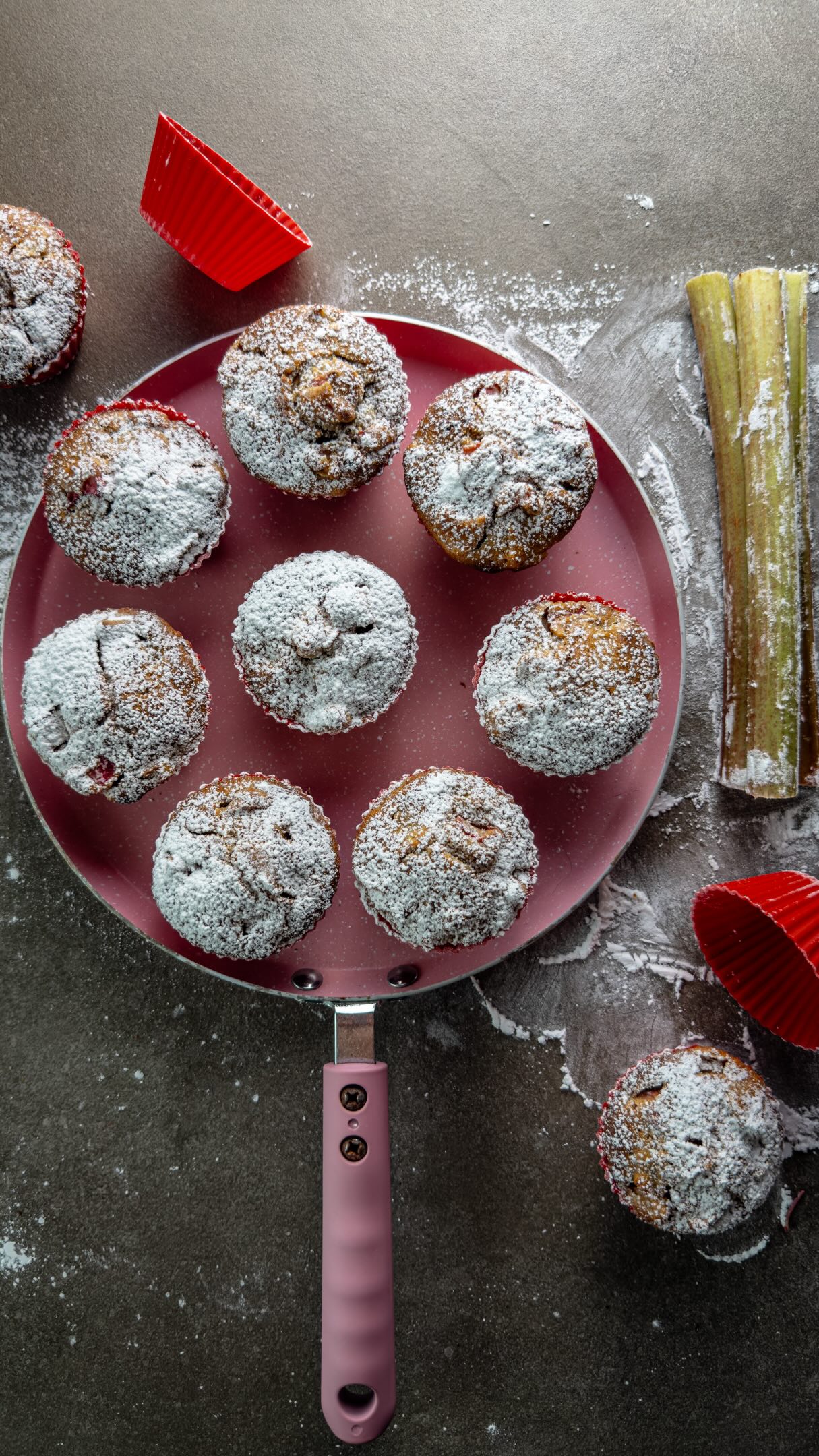🎋RHUBARB MUFFINS RECIPE🥧  Ingredients
Makes 12 muffins  🔸½ cup (60g) fine wheat flour (cake or pastry flour)
🔸½ cup (60g) organic whole wheat flour, plain
🔸2 tsp baking powder
🔸5 Tbsp (70g) extra virgin coconut oil, melted and cooled to room temperature
🔸50g (about 3 Tbsp) active sourdough starter (no starter? just use an extra 50g/3 Tbsp Greek yogurt instead)
🔸50g (about 3 Tbsp) heavy cream
🔸100g (scant ½ cup) full-fat Greek yogurt
🔸2 large eggs, free-range and organic if you can
🔸½ cup (100g) raw demerara sugar or other unrefined sugar
🔸2–3 long rhubarb stalks (270–330g / about 9–11 oz), peeled if older and stiffer stalks (no need to peel if rather young and fresh), and chopped  Instructions  1.	Preheat your oven to 400°F (200°C). A note from experience: know your oven and bake accordingly. Mine runs hot and browns tops too fast on convection alone, so I sometimes start with top-and-bottom heat for the first 10 minutes, then finish with the fan on. Use whichever setting keeps your muffin tops from over-baking before the centers catch up.
2.	Chop the rhubarb into small pieces, peeling first only if the stalks are older and stiffer — young, fresh stalks don’t need peeling.
3.	Whisk the two flours together with the baking powder in a medium bowl.
4.	In a separate bowl, whisk together the sourdough starter (if using), Greek yogurt, and heavy cream until smooth. Add the melted (cooled) coconut oil one tablespoon at a time, stirring until fully incorporated.
5.	In a third bowl, whisk the eggs and sugar together until just properly incorporated.
6.	Combine all three mixtures gently — from this point on, fold rather than mix or whip. Fold in the chopped rhubarb last.
7.	Divide the batter between 12 muffin liners or silicone muffin cups (genuinely one of the best kitchen upgrades you can make). No need to hold back to the usual ⅔ or half full — these muffins hold their shape well, so you can fill the cups right to the edge, even with a slight heap, without worrying about them falling apart in the oven.
8.	Bake for up to 20 minutes, until the tops are golden and spring back to a light touch.  9. Cool on a wire rack at least a bit.
